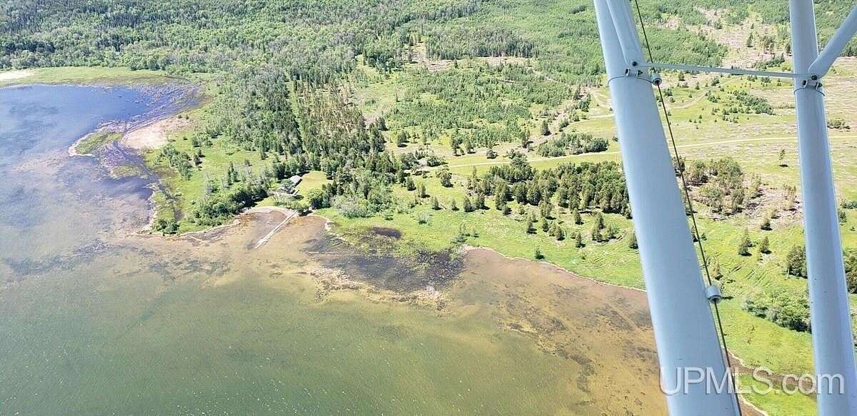 234 Acres of Recreational Land with Home for Sale in Rapid River, Michigan