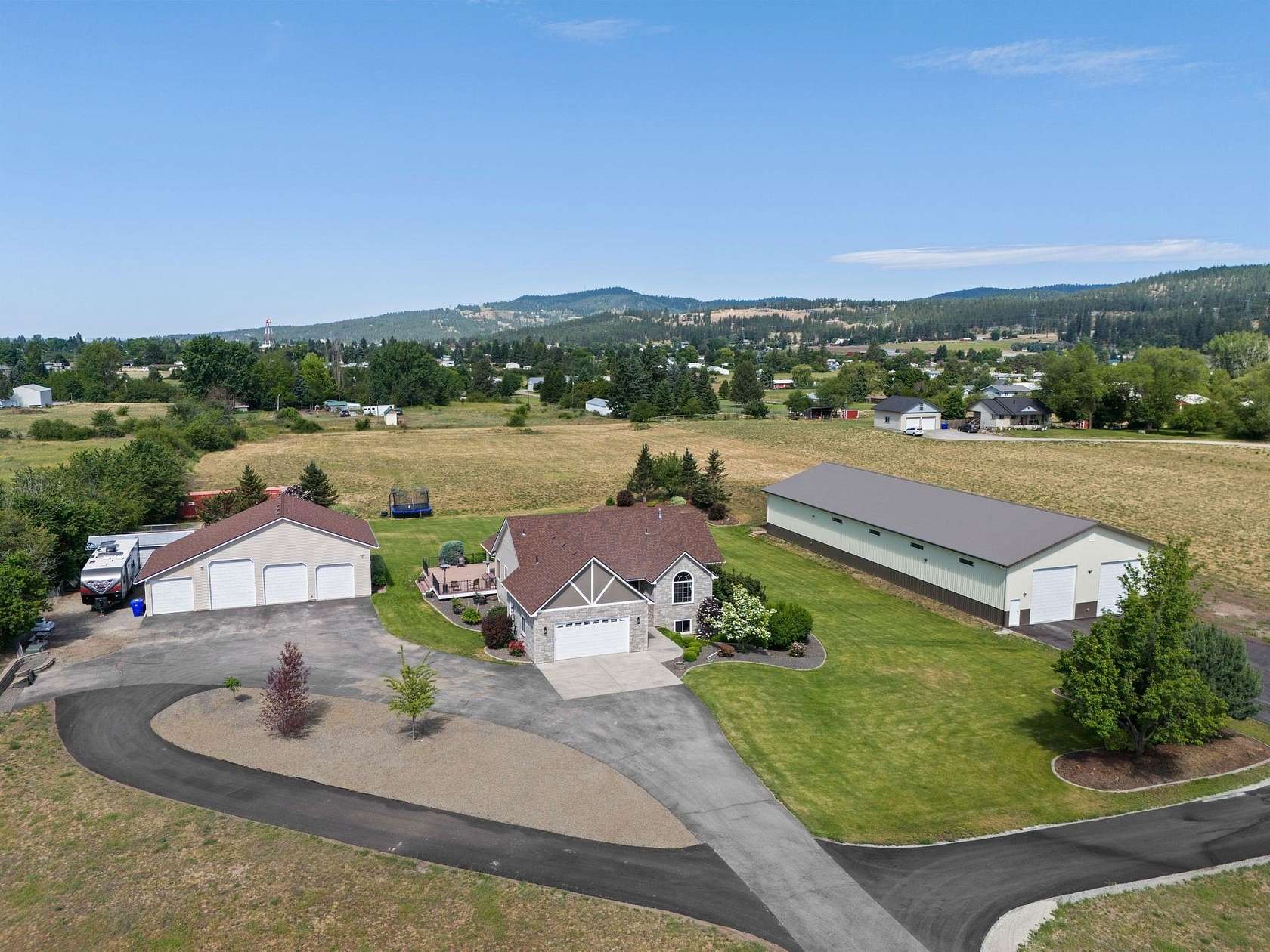 5.1 Acres of Land with Home for Sale in Otis Orchards, Washington