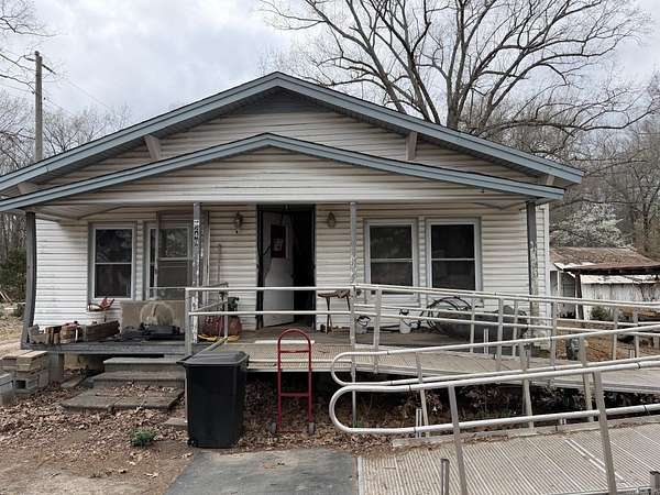 4.29 Acres of Land with Home for Sale in Oppelo, Arkansas