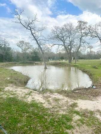 6.54 Acres of Land with Home for Sale in Madisonville, Texas