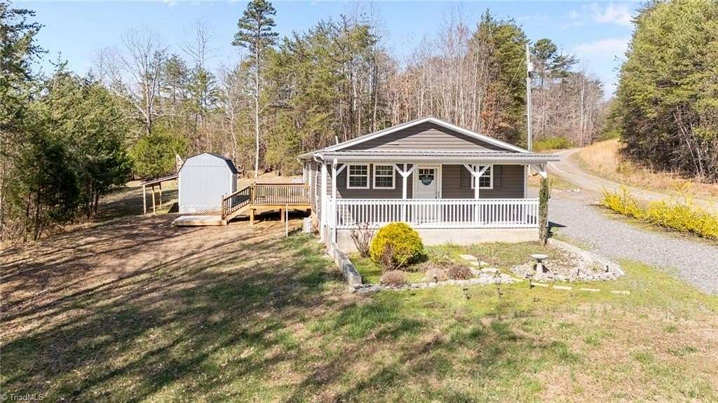 10.4 Acres of Recreational Land with Home for Sale in Pilot Mountain, North Carolina