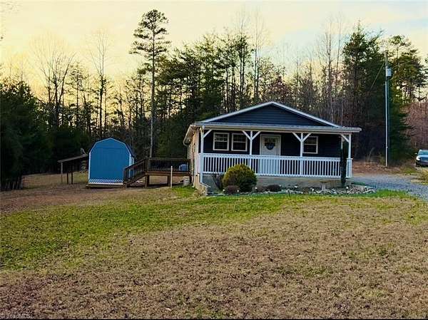 10.4 Acres of Recreational Land with Home for Sale in Pilot Mountain, North Carolina