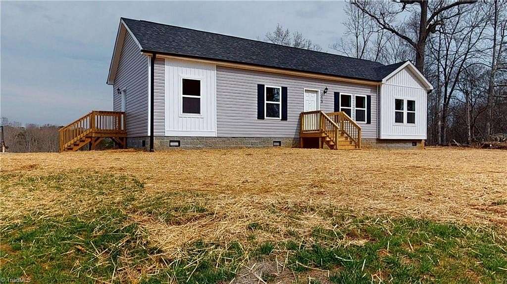 2.37 Acres of Land with Home for Sale in Dobson, North Carolina