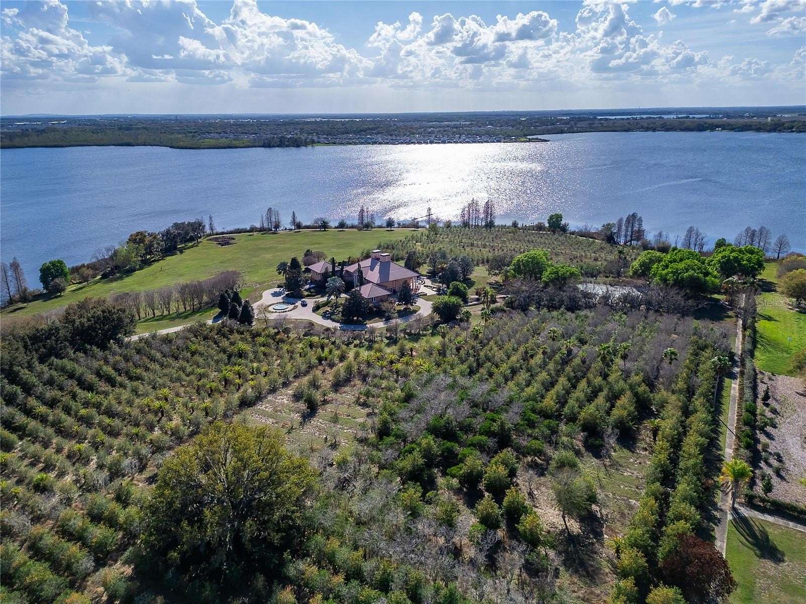 12.8 Acres of Land with Home for Sale in Auburndale, Florida