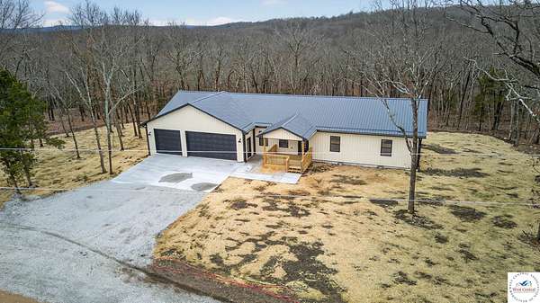 6.5 Acres of Land with Home for Sale in Warsaw, Missouri