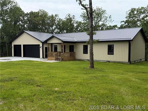 6.5 Acres of Land with Home for Sale in Warsaw, Missouri