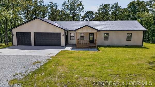 6.5 Acres of Land with Home for Sale in Warsaw, Missouri
