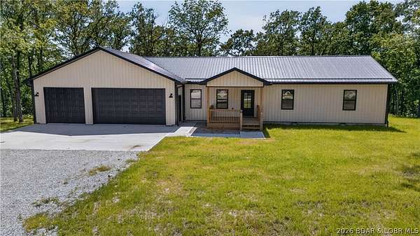 6.5 Acres of Land with Home for Sale in Warsaw, Missouri