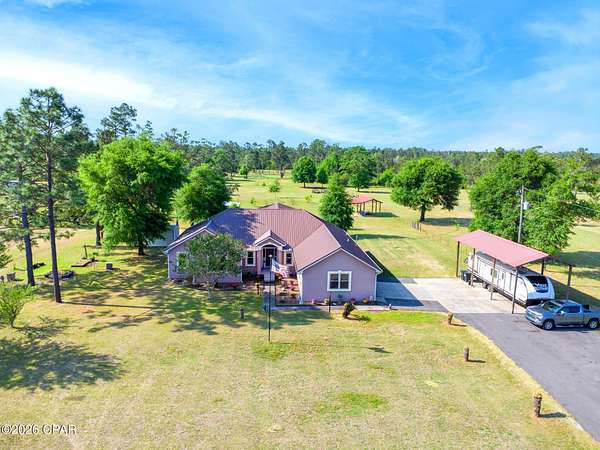 5 Acres of Land with Home for Sale in Fountain, Florida