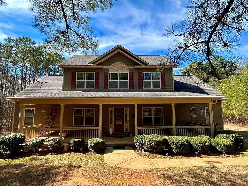 4 Acres of Land with Home for Sale in Smiths Station, Alabama