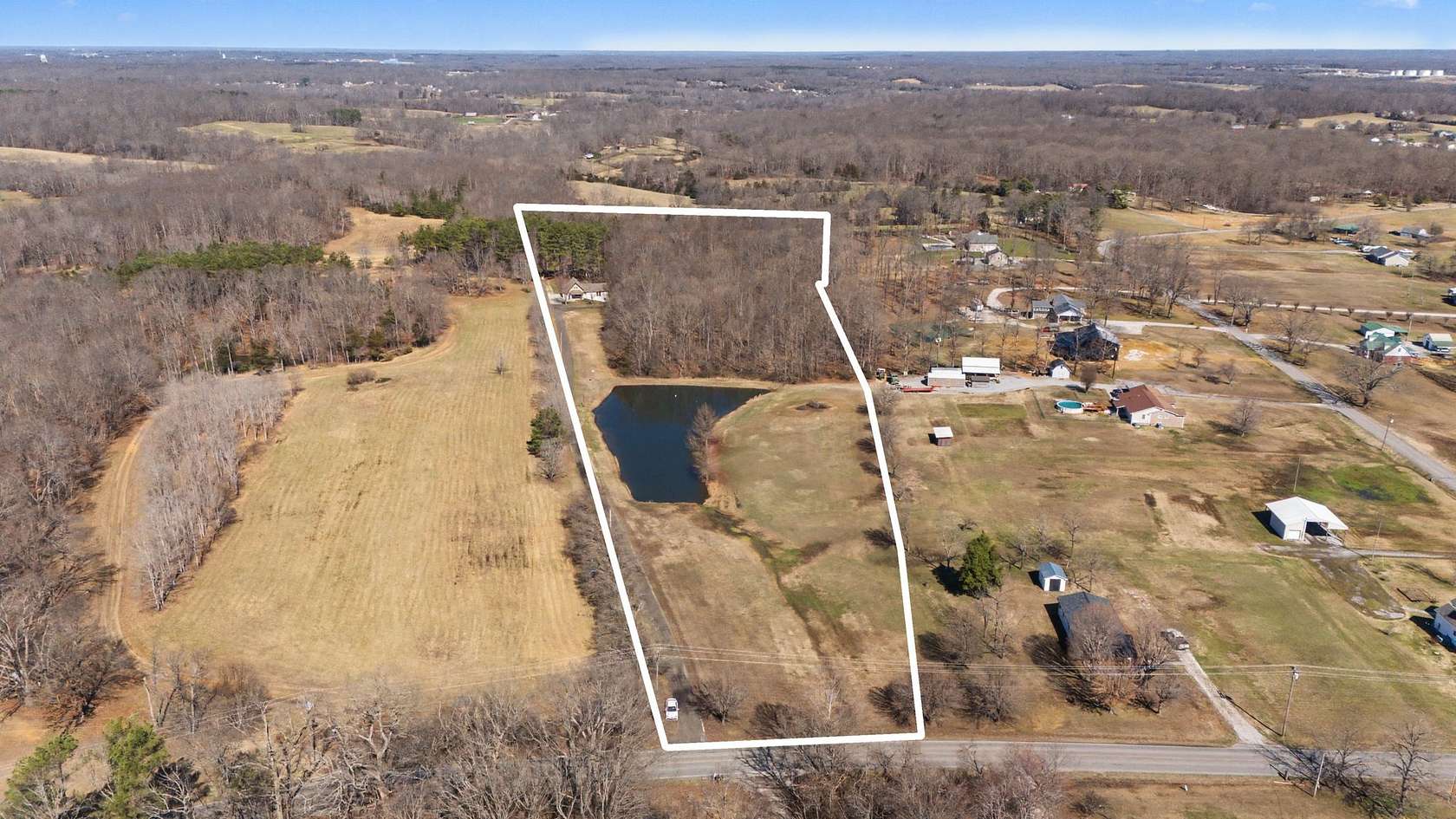 12.2 Acres of Land with Home for Sale in Bon Aqua, Tennessee