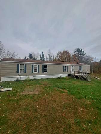 10.7 Acres of Land with Home for Sale in China, Maine