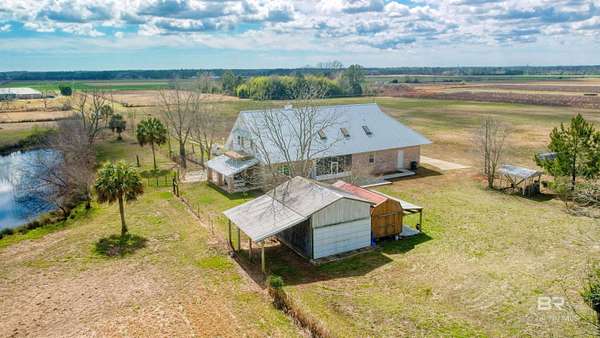 10.2 Acres of Land with Home for Sale in Elberta, Alabama