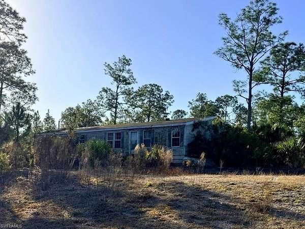 4.9 Acres of Land with Home for Sale in Naples, Florida