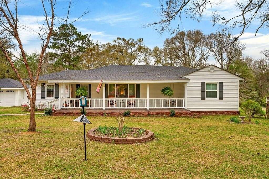 23.2 Acres of Recreational Land with Home for Sale in Carriere, Mississippi