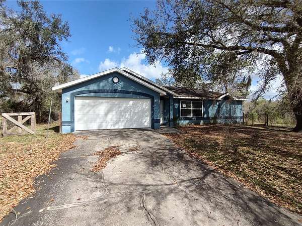 3.34 Acres of Land with Home for Sale in De Leon Springs, Florida