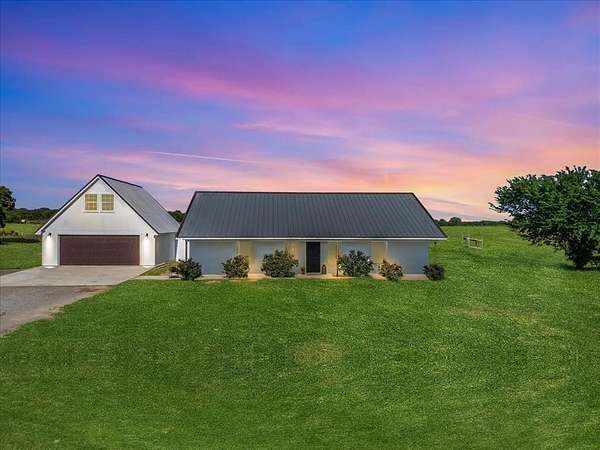 12 Acres of Recreational Land with Home for Sale in Poolville, Texas