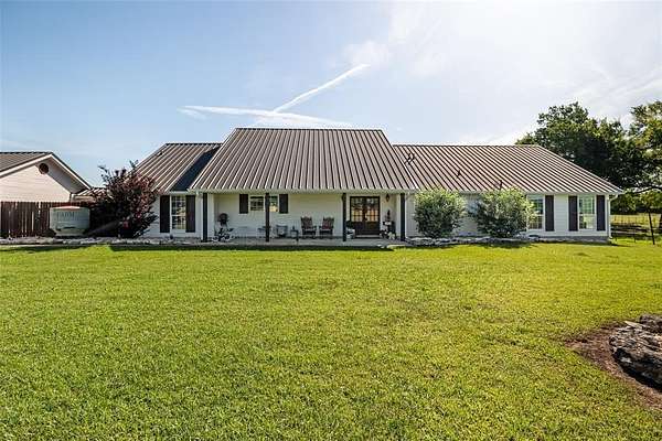 58.2 Acres of Recreational Land with Home for Sale in Walnut Springs, Texas