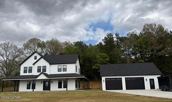 2 Acres of Land with Home for Sale in Gadsden, Tennessee