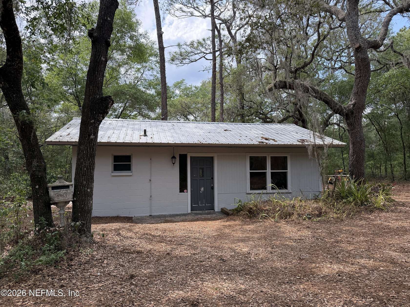 1.28 Acres of Land with Home for Sale in Melrose, Florida