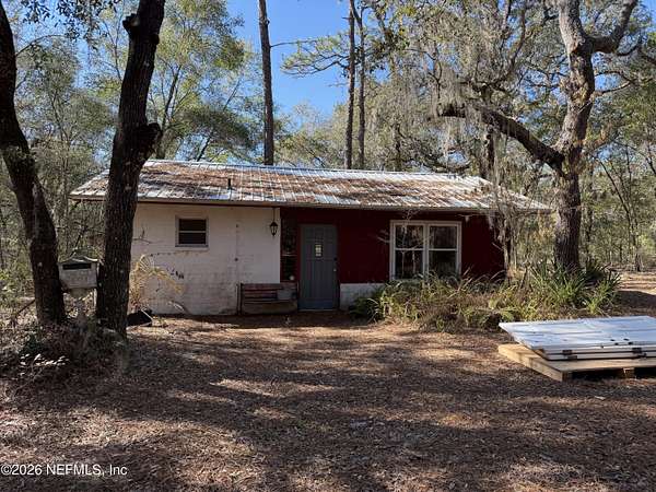 1.28 Acres of Land with Home for Sale in Melrose, Florida