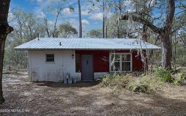 1.28 Acres of Land with Home for Sale in Melrose, Florida