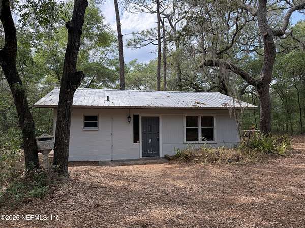 1.28 Acres of Land with Home for Sale in Melrose, Florida