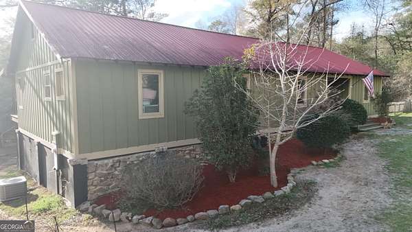 1.5 Acres of Land with Home for Sale in Irwinton, Georgia