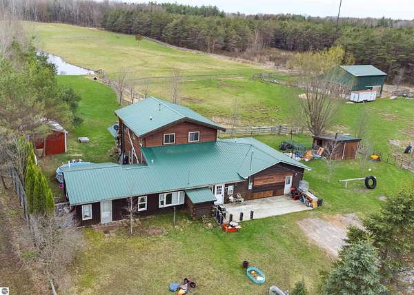 9.67 Acres of Land with Home for Sale in Marion, Michigan
