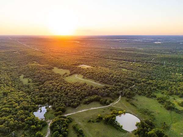 880 Acres of Land with Home for Sale in Wardville, Oklahoma