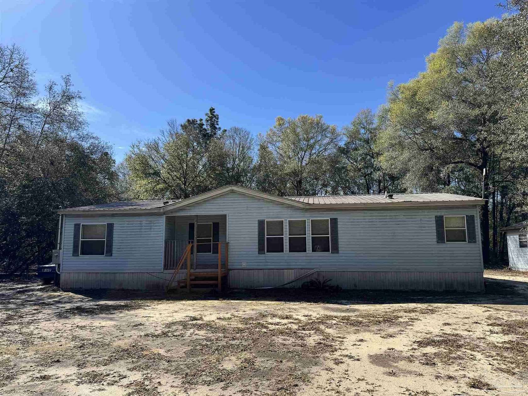 5.89 Acres of Land with Home for Sale in Milton, Florida