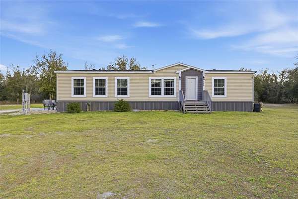 10 Acres of Recreational Land with Home for Sale in Fort White, Florida