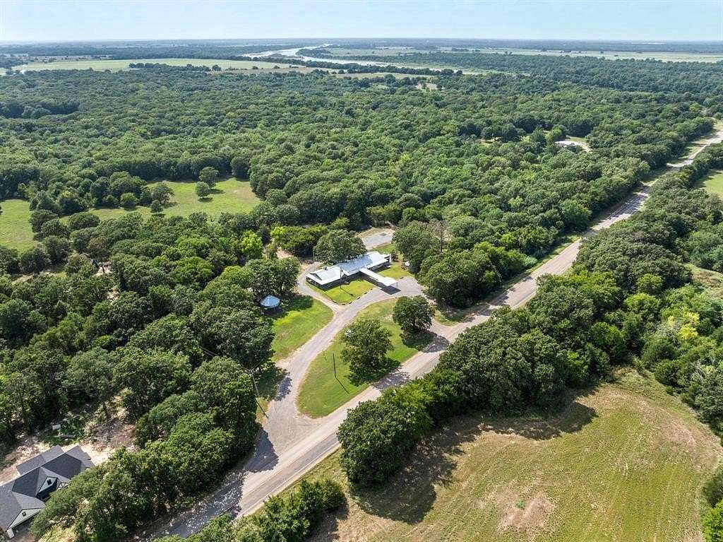 4.9 Acres of Improved Residential Land for Sale in Ravenna, Texas