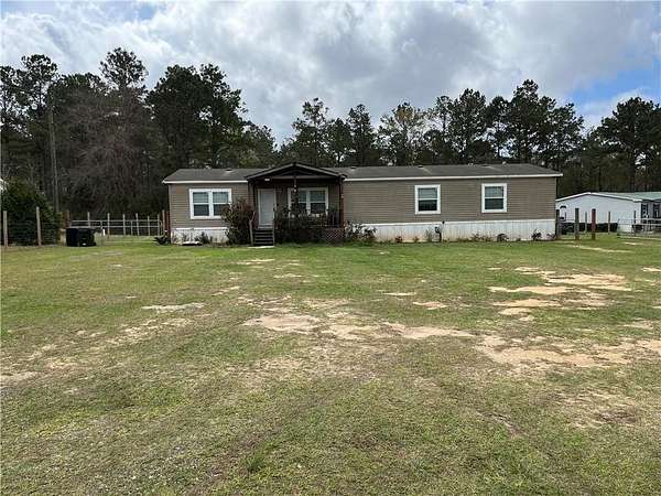 2.13 Acres of Land with Home for Sale in Wilmer, Alabama