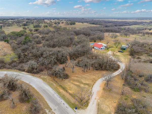 16.9 Acres of Land with Home for Sale in Blanket, Texas