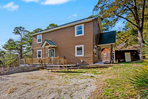 5 Acres of Land with Home for Sale in Pineville, Missouri