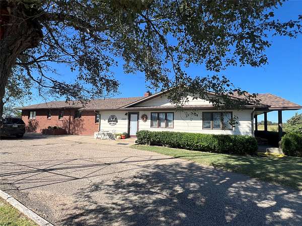 48.5 Acres of Agricultural Land with Home for Sale in Dodge City, Kansas