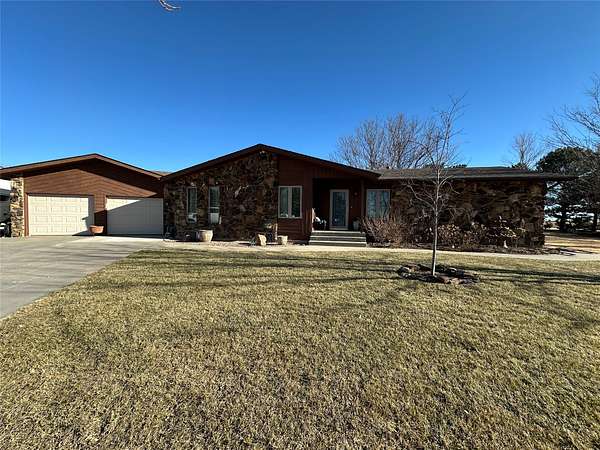 5.7 Acres of Land with Home for Sale in Dodge City, Kansas