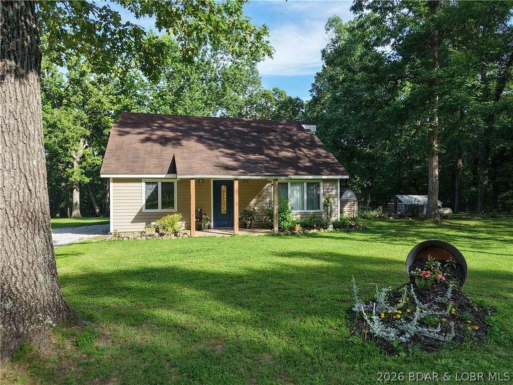6.46 Acres of Land with Home for Sale in Gravois Mills, Missouri