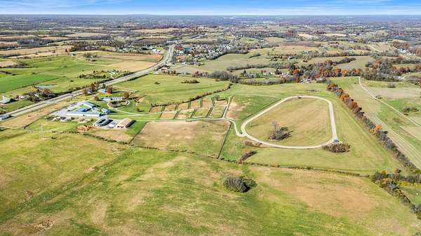 96 Acres of Agricultural Land with Home for Sale in Salvisa, Kentucky