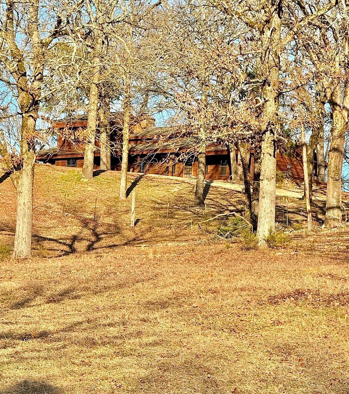 17.4 Acres of Land with Home for Sale in Broken Bow, Oklahoma