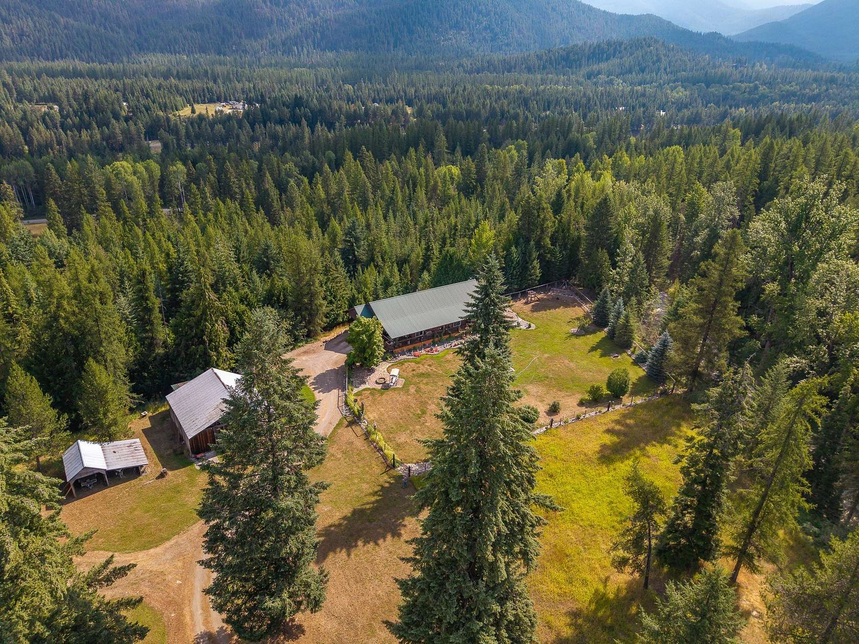 21.9 Acres of Recreational Land with Home for Sale in Noxon, Montana