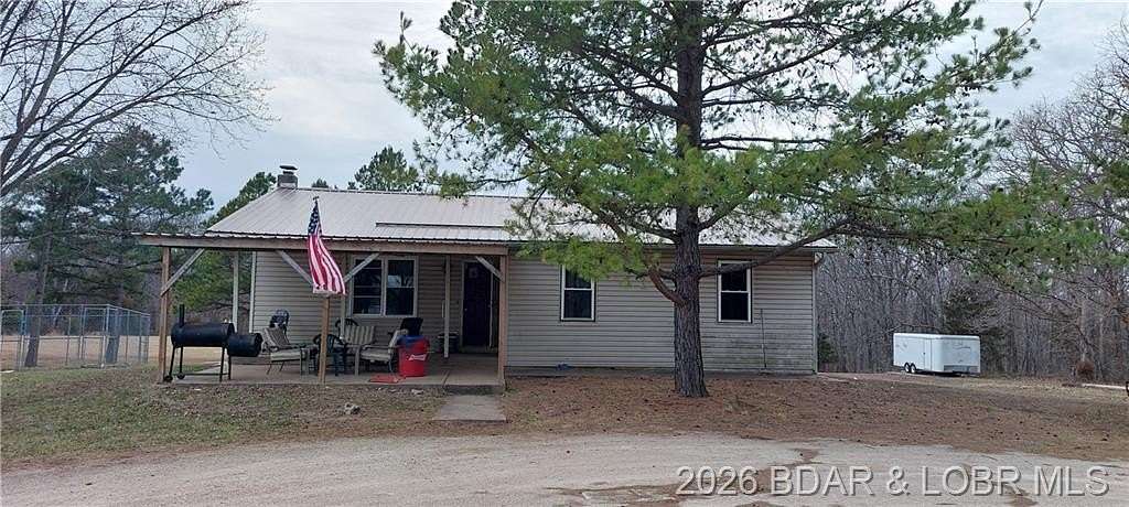 3.3 Acres of Land with Home for Sale in Stover, Missouri