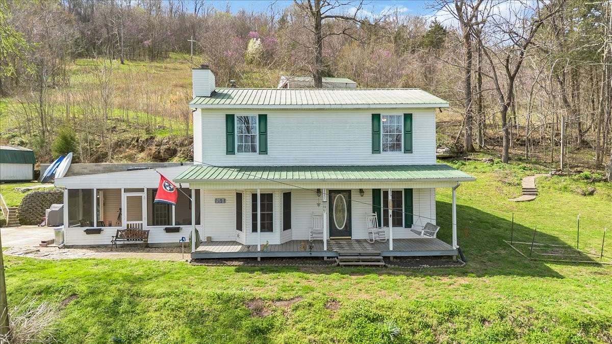 7.9 Acres of Land with Home for Sale in Dowelltown, Tennessee