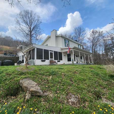 7.9 Acres of Land with Home for Sale in Dowelltown, Tennessee