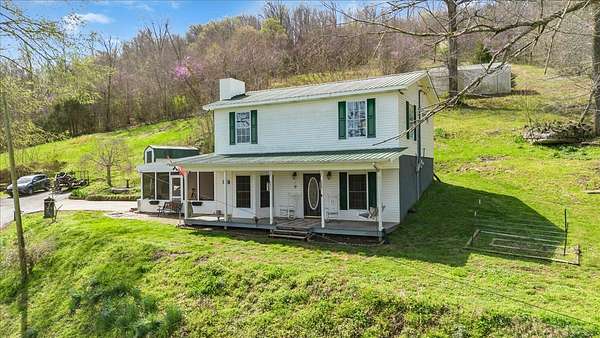 7.9 Acres of Land with Home for Sale in Dowelltown, Tennessee
