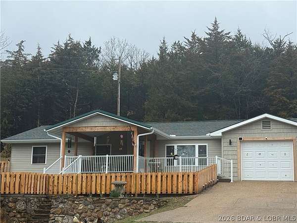 4.55 Acres of Land with Home for Sale in Versailles, Missouri