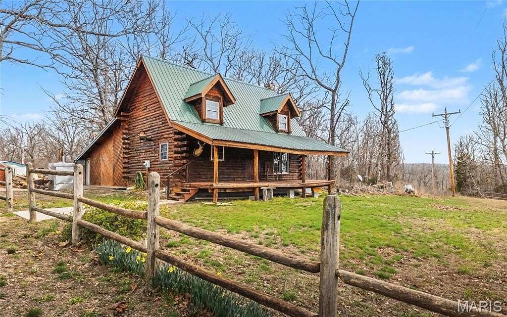 6.4 Acres of Land with Home for Sale in Devils Elbow, Missouri