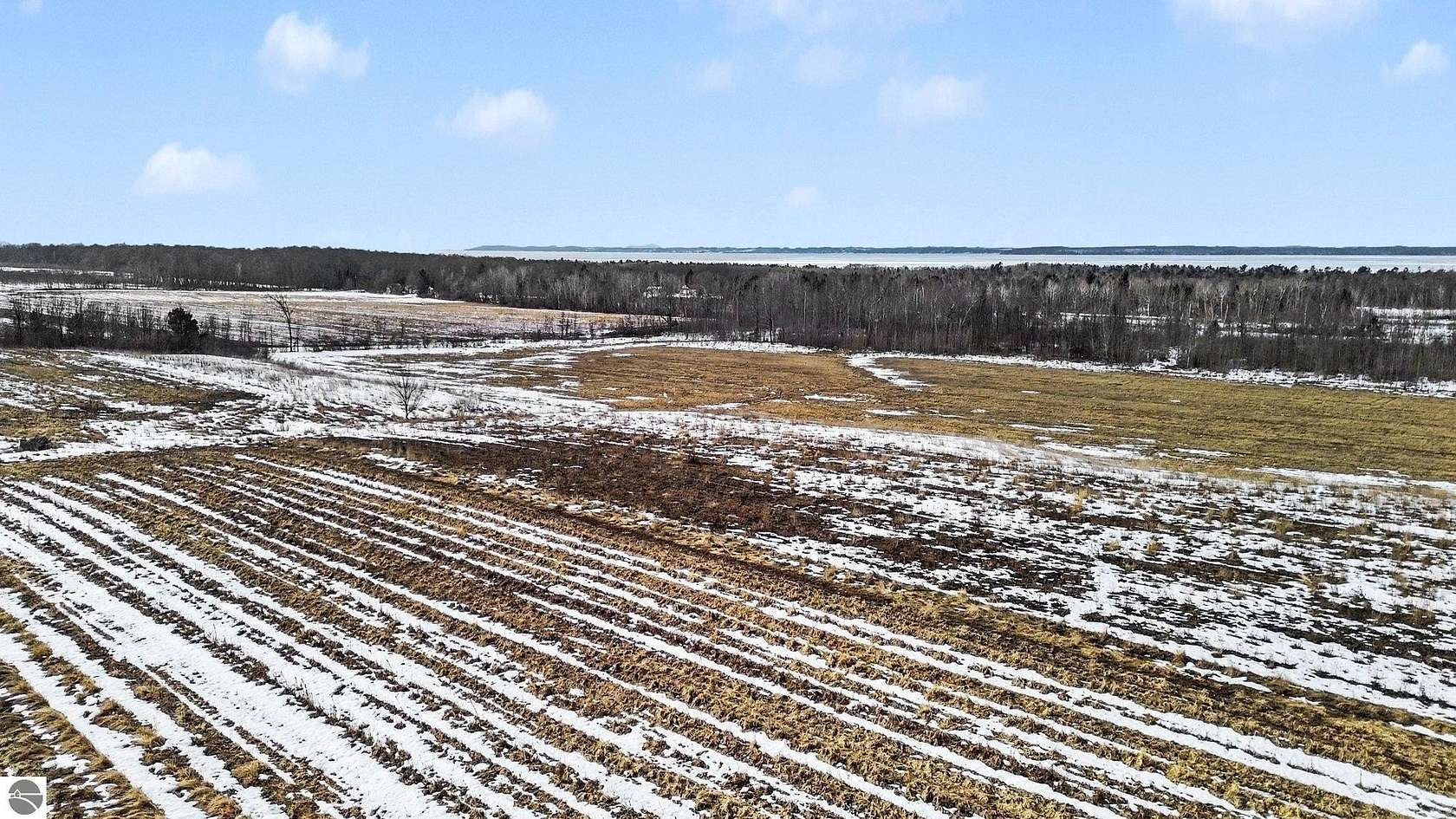 10 Acres of Residential Land for Sale in Kewadin, Michigan