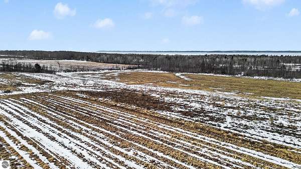 10 Acres of Residential Land for Sale in Kewadin, Michigan